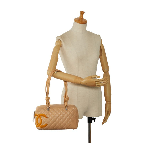 シャネル カンボン ココマーク ボーリングバッグ ハンドバッグ ベージュ オレンジ ラムスキン レディース CHANEL 【中古】