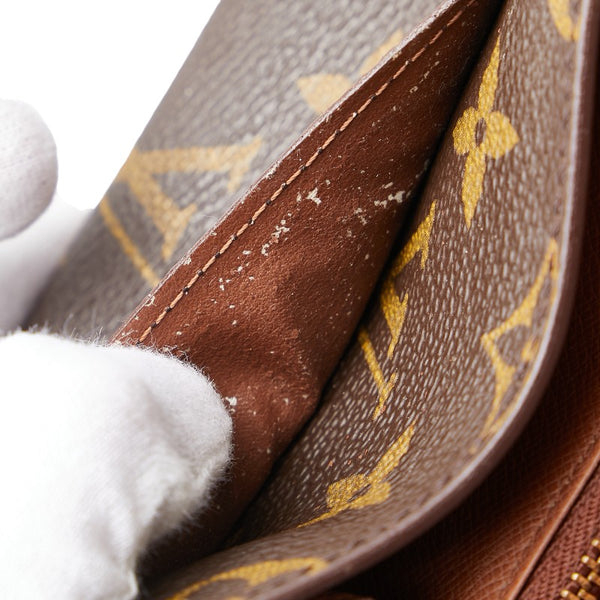 ルイ ヴィトン モノグラム ポシェット ポルト モネ クレディ 長財布 M61725 ブラウン PVC レザー レディース LOUIS VUITTON 【中古】