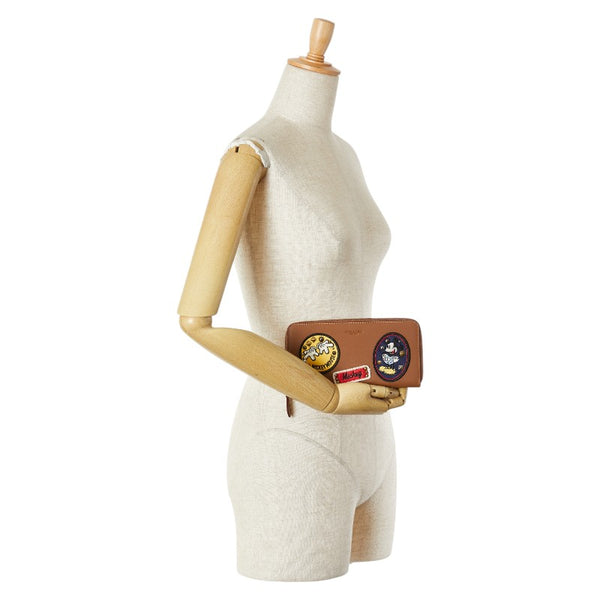 コーチ ×ディズニー ミッキーマウス パッチワーク アコーディオン ジップ 長財布 ラウンドファスナー F59340 ブラウン レザー レディース COACH 【中古】