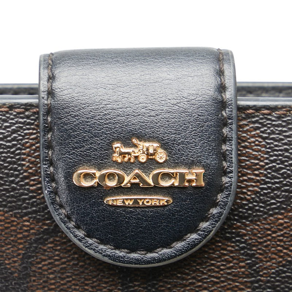 コーチ シグネチャー 二つ折り財布 C0082 ブラウン ブラック PVC レザー レディース COACH 【中古】