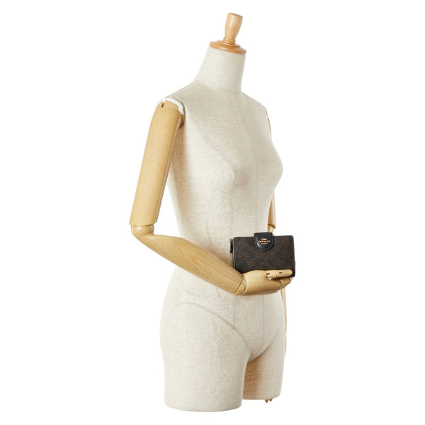 コーチ シグネチャー 二つ折り財布 C0082 ブラウン ブラック PVC レザー レディース COACH 【中古】