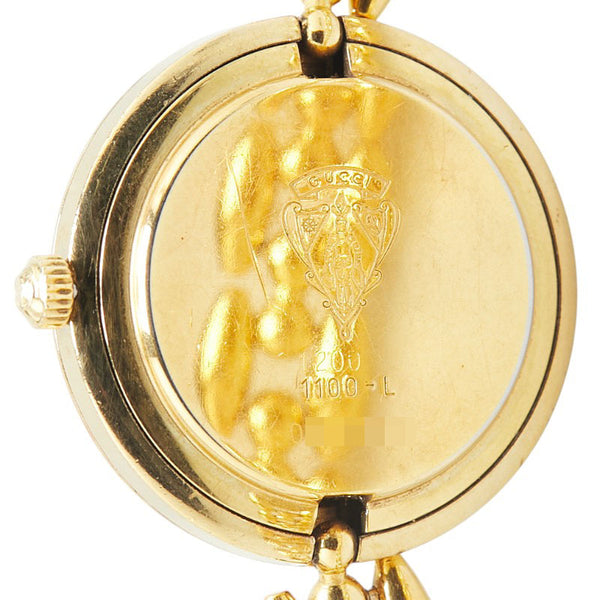 グッチ チェンジベゼルウォッチ 腕時計 1100-L クオーツ ホワイト文字盤 メッキ レディース GUCCI 【中古】