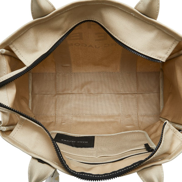 マークジェイコブス ザ ミディアム トラベラー グラフィック トートバッグ ベージュ ホワイト キャンバス レディース MARC JACOBS 【中古】