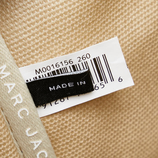 マークジェイコブス ザ ミディアム トラベラー グラフィック トートバッグ ベージュ ホワイト キャンバス レディース MARC JACOBS 【中古】