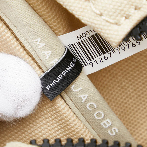 マークジェイコブス ザ ミディアム トラベラー グラフィック トートバッグ ベージュ ホワイト キャンバス レディース MARC JACOBS 【中古】