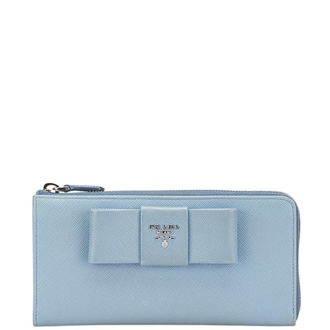 プラダ フィオッコ リボンモチーフ L字ファスナー 長財布 1ML183 ライトブルー サフィアーノレザー レディース PRADA 【中古】