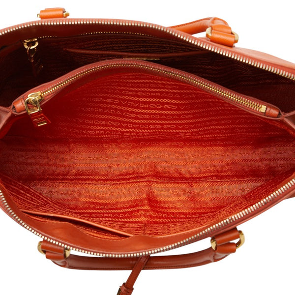 プラダ 三角ロゴプレート ハンドバッグ オレンジ レザー レディース PRADA 【中古】