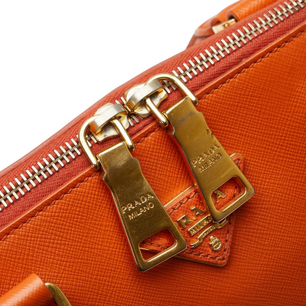 プラダ 三角ロゴプレート ハンドバッグ オレンジ レザー レディース PRADA 【中古】