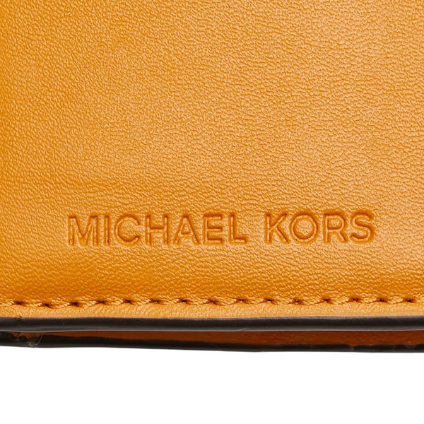 マイケルコース JET SET TRAVEL L字ファスナー 二つ折り財布 ブラウン PVC レディース Michael Kors 【中古】