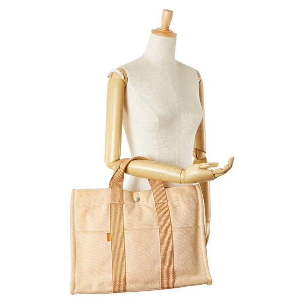 エルメス ニュー フールトゥ トートMM ハンドバッグ トートバッグ オレンジ キャンバス レディース HERMES 【中古】