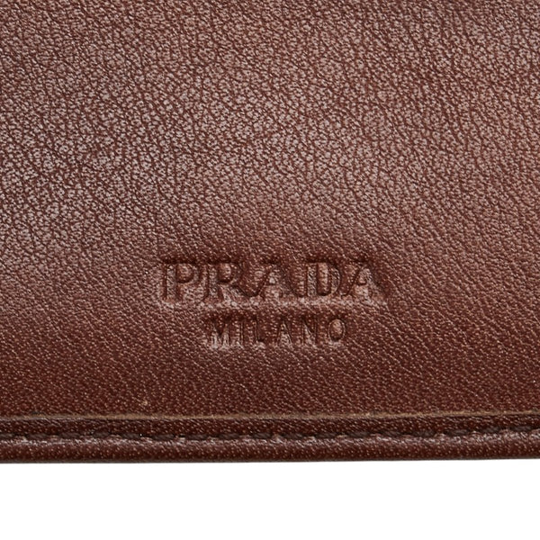 プラダ ロゴ金具 二つ折り財布 ブラウン レザー レディース PRADA 【中古】