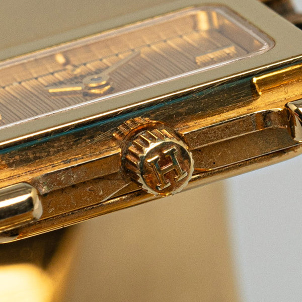 エルメス ロケ バングルウォッチ 腕時計 L01.201 クオーツ ゴールド文字盤 メッキ リザード レディース HERMES 【中古】