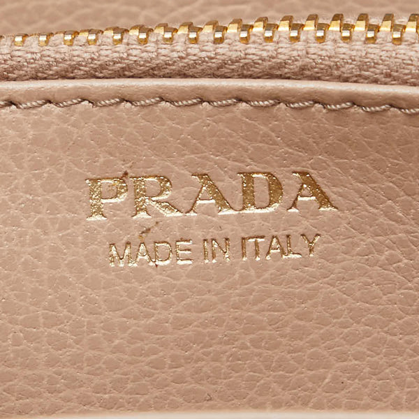 プラダ 三角ロゴプレート 長財布 ラウンドファスナー ベージュ レザー レディース PRADA 【中古】