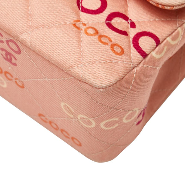 シャネル ココマーク COCOプリント ダブルフラップ チェーン ショルダーバッグ サーモンピンク マルチカラー キャンバス レディース CHANEL 【中古】