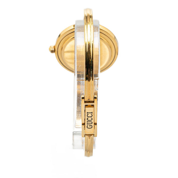 グッチ チェンジベゼル バングルウォッチ 腕時計 クオーツ ホワイト文字盤 メッキ レディース GUCCI 【中古】