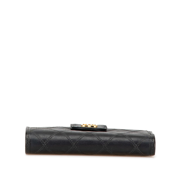 シャネル ワイルドステッチ ココマーク がま口 二つ折り財布 ブラック ラムスキン レディース CHANEL 【中古】