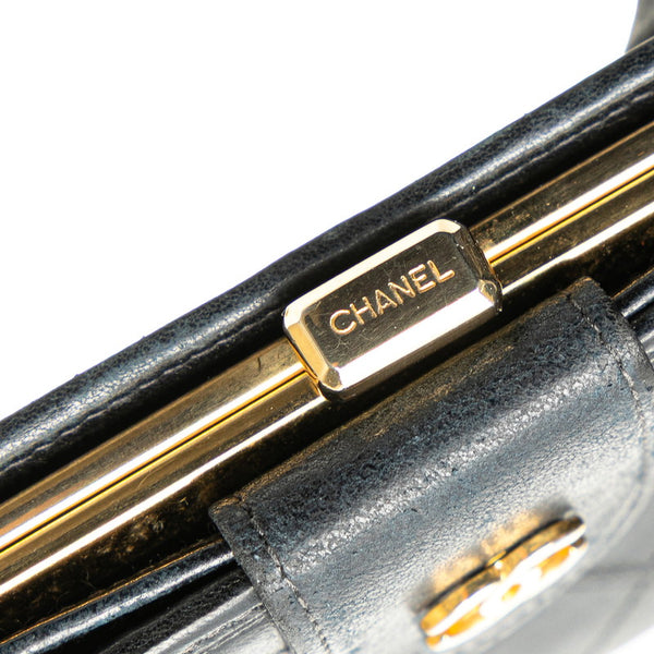 シャネル ワイルドステッチ ココマーク がま口 二つ折り財布 ブラック ラムスキン レディース CHANEL 【中古】