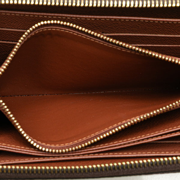 ルイ ヴィトン モノグラム ジッピーウォレット ラウンドファスナー 長財布 M60017 ブラウン PVC レザー レディース LOUIS VUITTON 【中古】