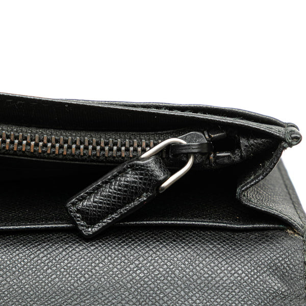 プラダ ロゴ金具 長財布 ブラック サフィアーノ レザー メンズ PRADA 【中古】