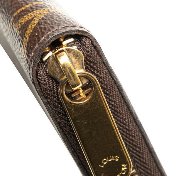ルイ ヴィトン モノグラム ジッピー ウォレット ラウンドファスナー 長財布 M42616 ブラウン PVC レザー レディース LOUIS VUITTON 【中古】