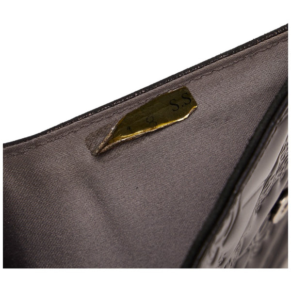 シャネル アイコンライン ココマーク 二つ折り財布 ブラック エナメル レザー レディース CHANEL 【中古】