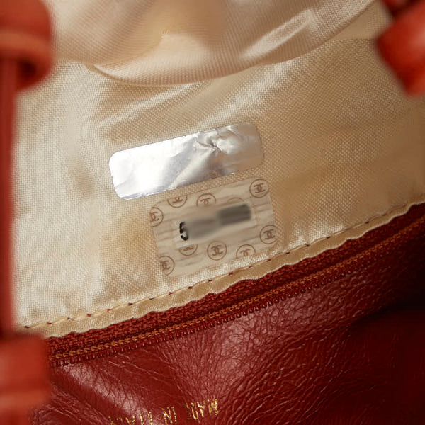 シャネル 編み込み 巾着 ショルダーバッグ オレンジ レザー レディース CHANEL 【中古】