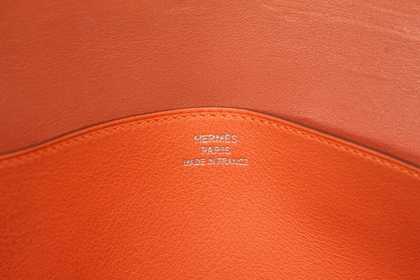エルメス ドゴン レクトヴェルソ オレンジ レザー 長財布 レディース HERMES □P刻印刻印 中古