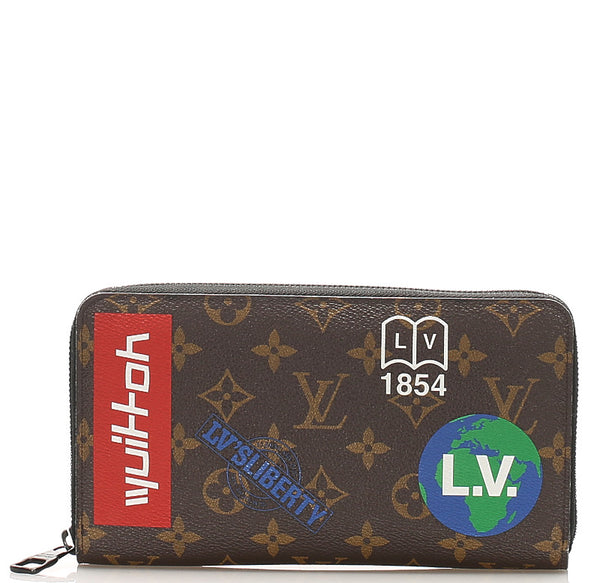 ルイ ヴィトン モノグラム ストーリー ロゴ  M67826 ブラウン PVC レザー 長財布 ユニセックス LOUIS VUITTON 中古