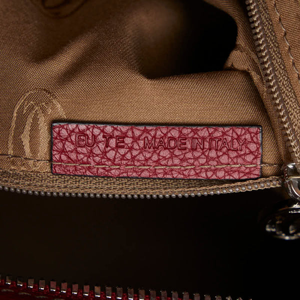 カルティエ マストライン パンチング ハンドバッグ レッド レザー レディース CARTIER 【中古】