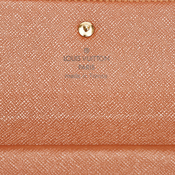 ルイ ヴィトン モノグラム ポルトフォイユ インターナショナル 長財布 M61217 ブラウン PVC レザー レディース LOUIS VUITTON 【中古】