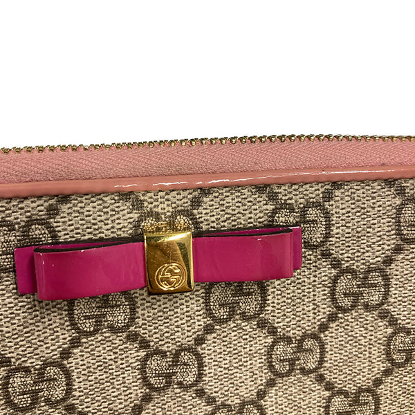 グッチ GGスプリーム リボン 388680 ブラウン ピンク PVC レザー ラウンドファスナー 長財布 レディース GUCCI 【中古】