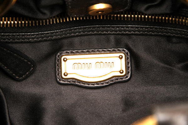 ミュウミュウ スタッズ ブラック 黒 レザー ショルダーバッグ レディース MIUMIU 中古