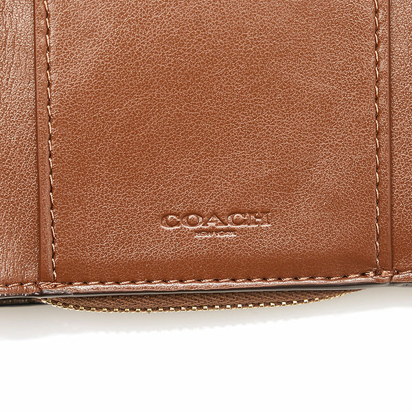 コーチ シグネチャー 二つ折り財布 ブラウン ベージュ PVC レザー レディース COACH 【中古】