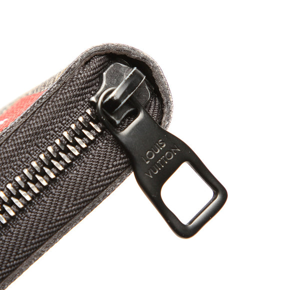 ルイ ヴィトン モノグラム ストーリー ロゴ  M67826 ブラウン PVC レザー 長財布 ユニセックス LOUIS VUITTON 中古