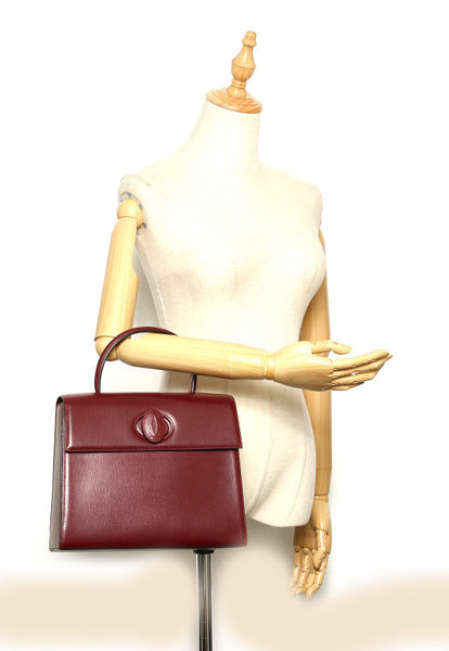 カルティエ マスト ワインレッド レザー ハンドバッグ レディース CARTIER 中古