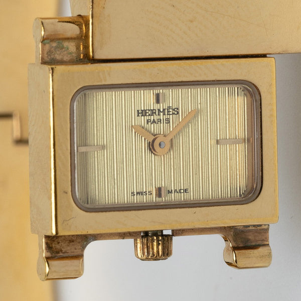 エルメス ロケ 白馬 七宝焼 バングル 腕時計 LO1.201 クオーツ ゴールド文字盤 メッキ レディース HERMES 【中古】