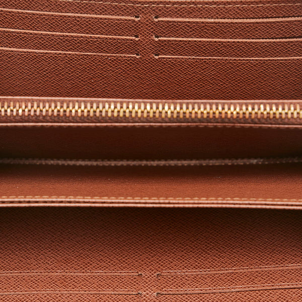 ルイ ヴィトン モノグラム ジッピーウォレット ラウンドファスナー 長財布 M42616 ブラウン PVC レディース LOUIS VUITTON 【中古】